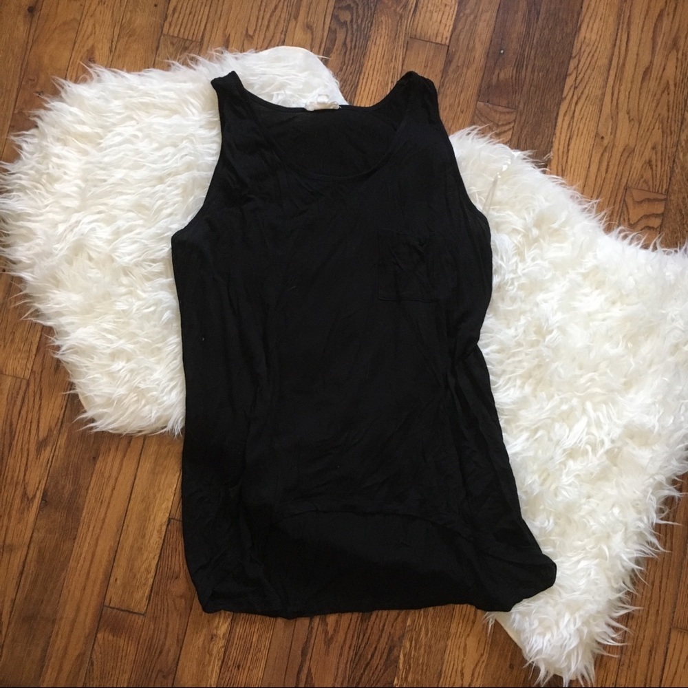 Slouchy black pocket tank.